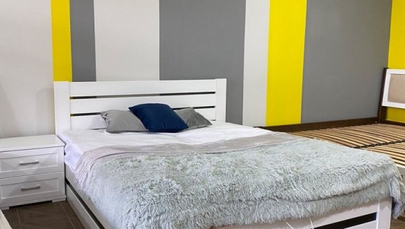 Ліжко дерев'яне Дрімка Лотос з підйомним механізмом та нішею для білизни Бук 24