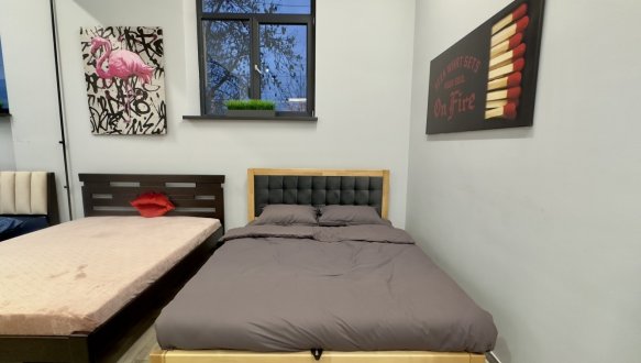 Кровать деревянная Лев Мардир 50 с подьемным механизмом и нишей для белья массив Бук 1